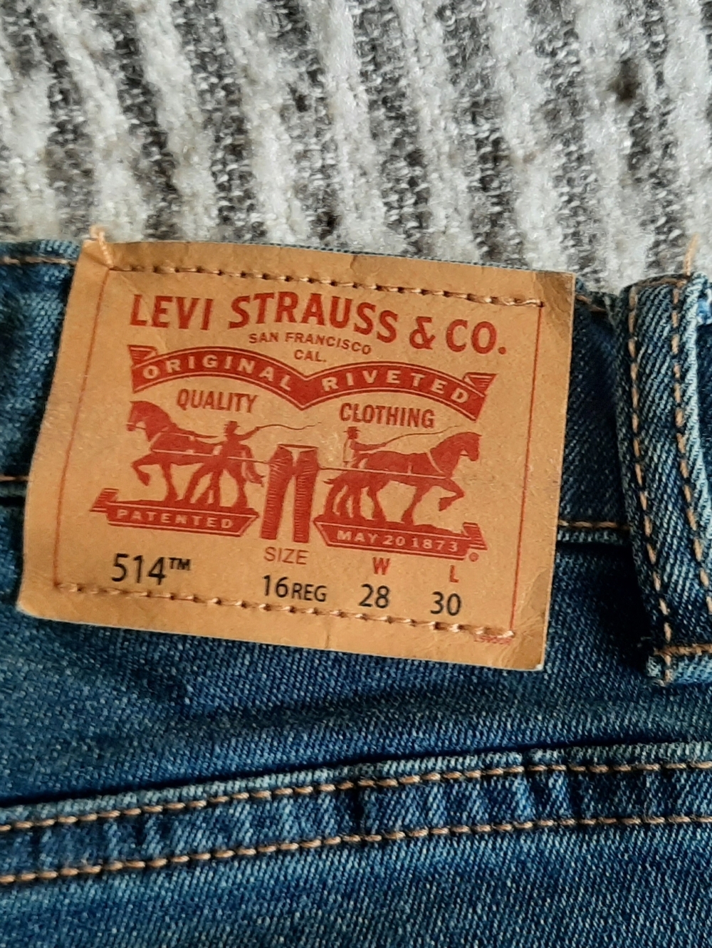 Levi's 514 Classic Blue Jeans with Tan Leather Patch